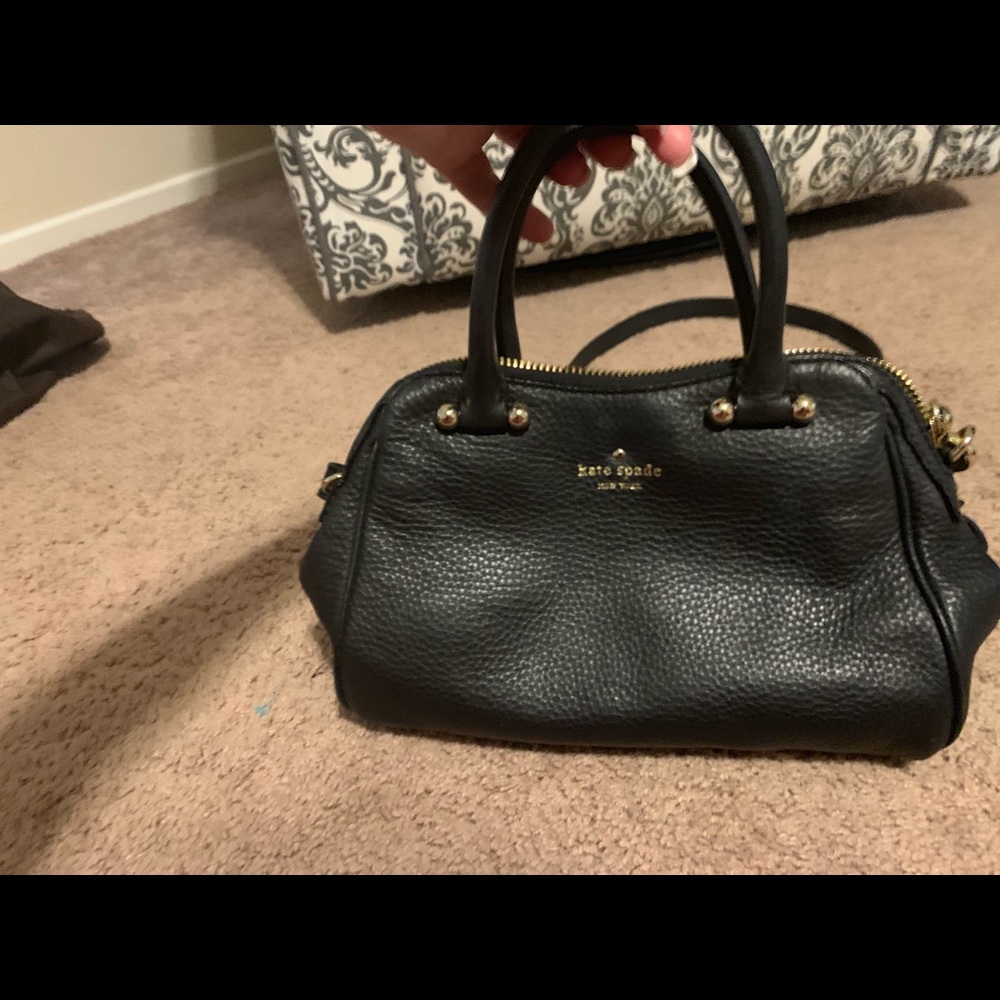 Black Kate Spade purse.